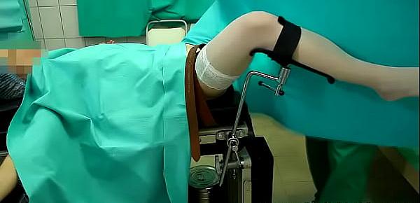  Gynecologist having fun with the patient